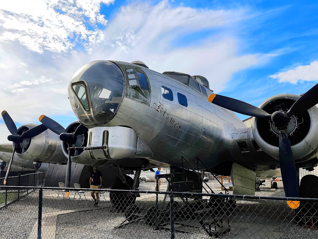 Historic four-engine military bomber displayed outdoors at the Planes of Fame Air Museum in Chino